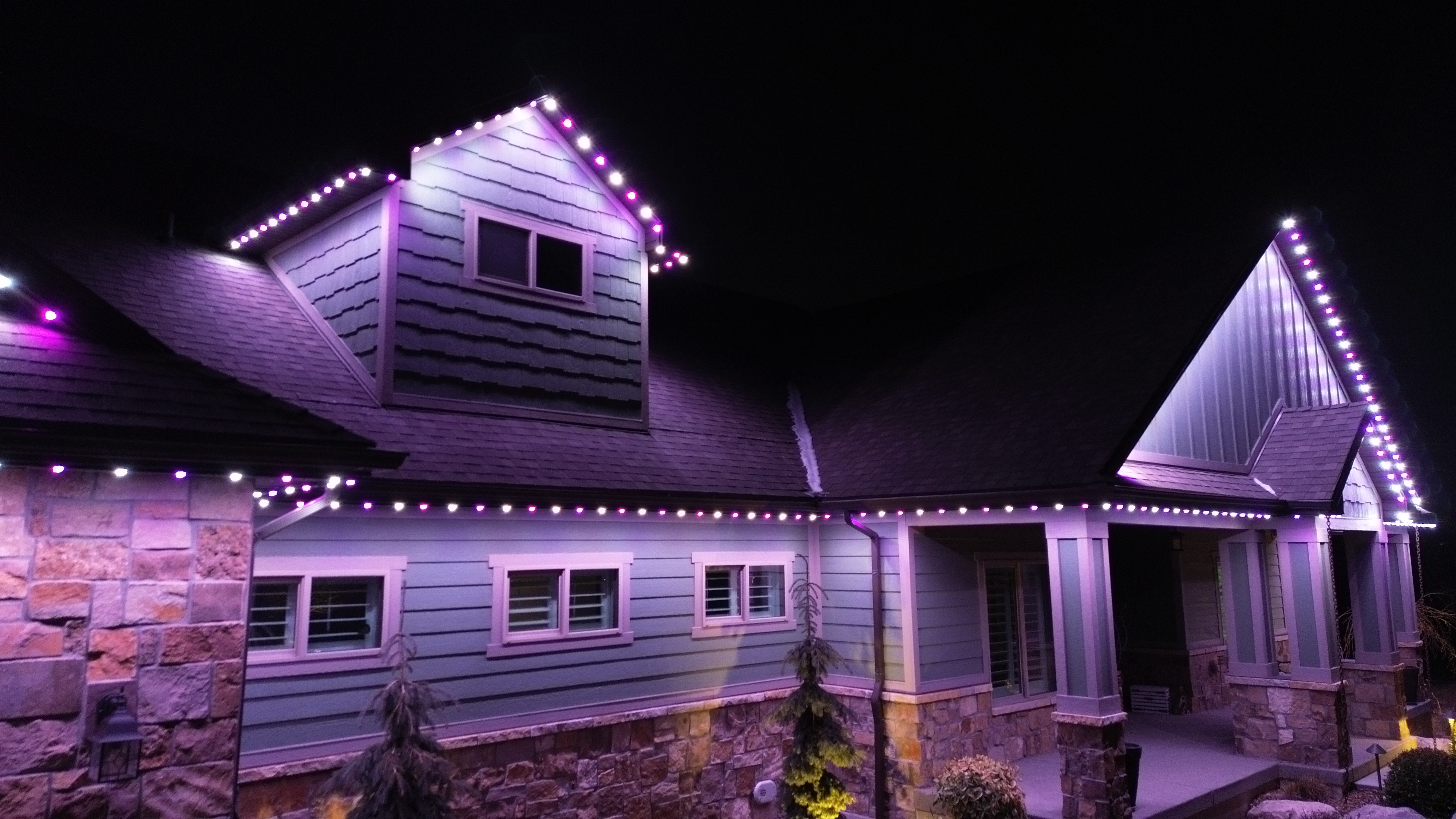 Purple and white TruLight roofline lighting